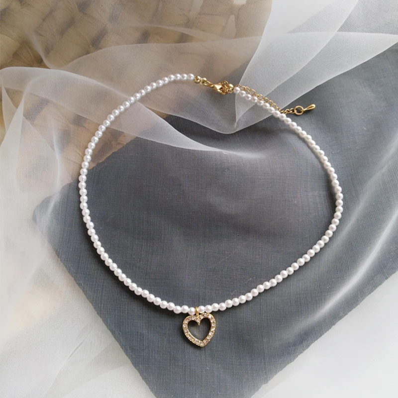 1PC Sweet Jewelry Bracelet Simple Design Small Simulated Pearls Bracelet With Delicate Heart Pendant Necklace Women Jewelry
1PC Sweet Jewelry Bracelet Simple Design Small Simulated Pearls Bracelet With Delicate Heart Pendant Necklace Women Jewelry