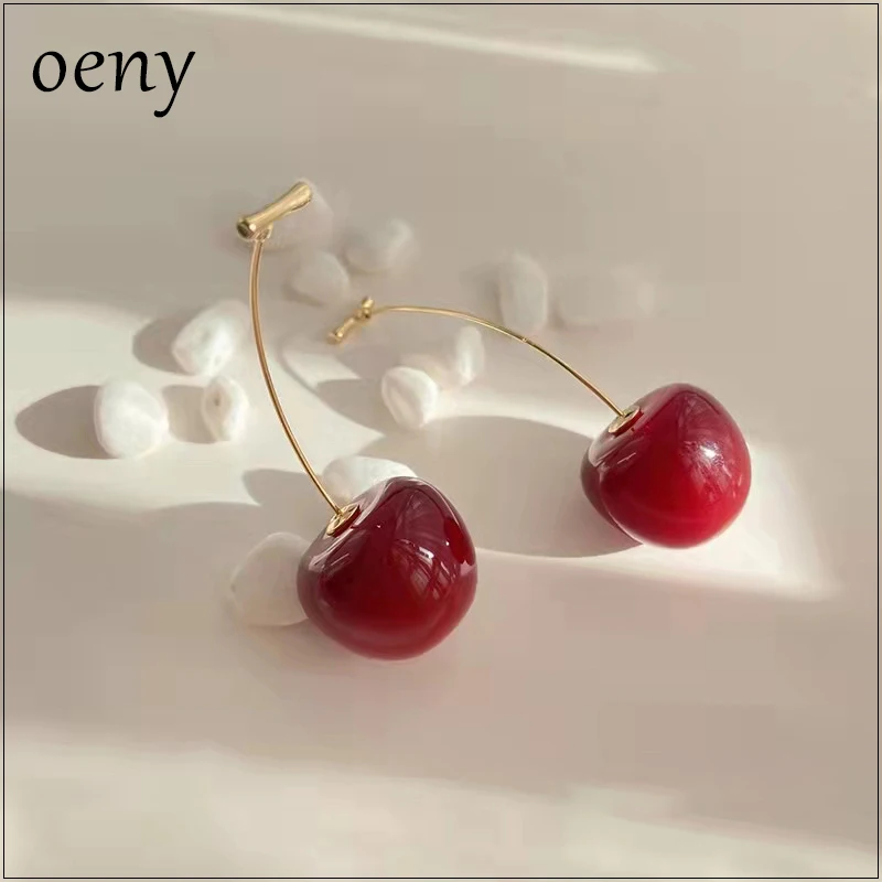 Oeny новые милые модные серьги в стиле ретро с красными вишнями, зажимы для ушей, длинные золотые полированные серьги для женщин и девочек
Oeny новые милые модные серьги в стиле ретро с красными вишнями, зажимы для ушей, длинные золотые полированные серьги для женщин и девочек