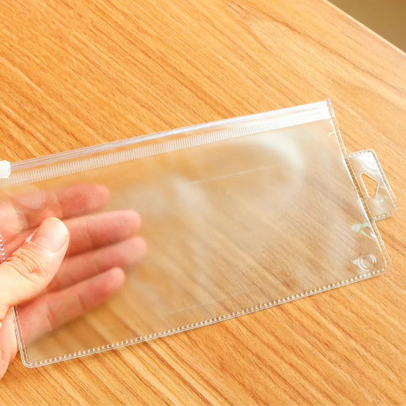 Transparent zipper pencil case PVC perforated frosted stationery storage bag Plastic packaging sealed pencil case
Transparent zipper pencil case PVC perforated frosted stationery storage bag Plastic packaging sealed pencil case
