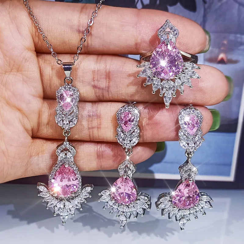 2023 New Fashion Pink Zircon Jewelry Set Shiny and Bright Tassel Zircon Earrings Ring Necklace Bridal Jewelry Wedding Jewelry
2023 New Fashion Pink Zircon Jewelry Set Shiny and Bright Tassel Zircon Earrings Ring Necklace Bridal Jewelry Wedding Jewelry