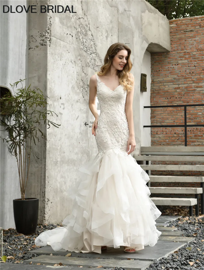 New Style Lace Wedding Dress Mermaid Ruffles Skirt V Neck Bridal Gown High Quality Factory Custom Made Dresses 
New Style Lace Wedding Dress Mermaid Ruffles Skirt V Neck Bridal Gown High Quality Factory Custom Made Dresses