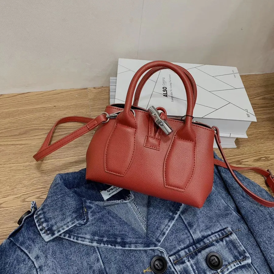 2021 new fashion PU female bag simple fashion large capacity business solid color small square bag portable diagonal bag 
2021 new fashion PU female bag simple fashion large capacity business solid color small square bag portable diagonal bag