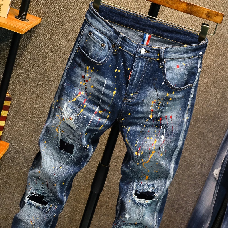 New style personality ripped jeans men's male Korean style trendy fashion paint dot splash ink design slim print pants trousers 
New style personality ripped jeans men's male Korean style trendy fashion paint dot splash ink design slim print pants trousers