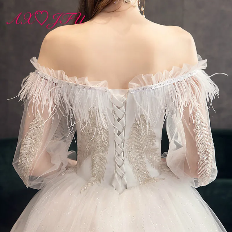 AXJFU princess flower lace wedding dress vintage boat neck beading feather illusion half sleeve ruffles white wedding dress
AXJFU princess flower lace wedding dress vintage boat neck beading feather illusion half sleeve ruffles white wedding dress