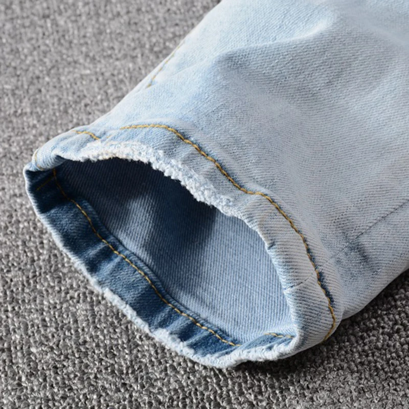 Sokotoo Men's pale light blue patchwork jeans Fashion slim skinny holes ripped stretch denim pants 
Sokotoo Men's pale light blue patchwork jeans Fashion slim skinny holes ripped stretch denim pants