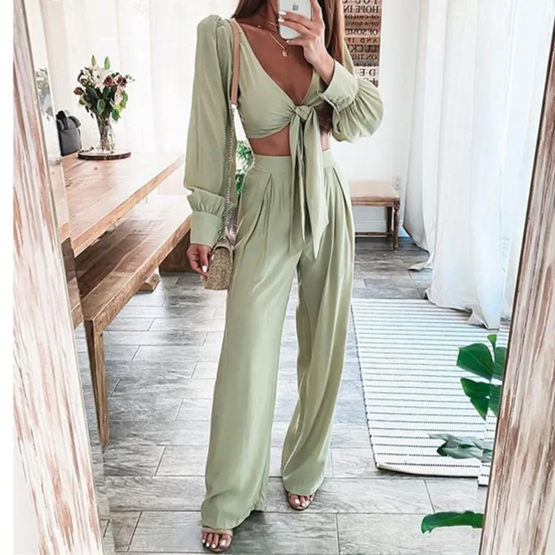 Женский Повседневный свободный однотонный комплект из укороченного топа с длинным рукавом и брюк с высокой талией и рюшами, 2021
Женский Повседневный свободный однотонный комплект из укороченного топа с длинным рукавом и брюк с высокой талией и рюшами, 2021