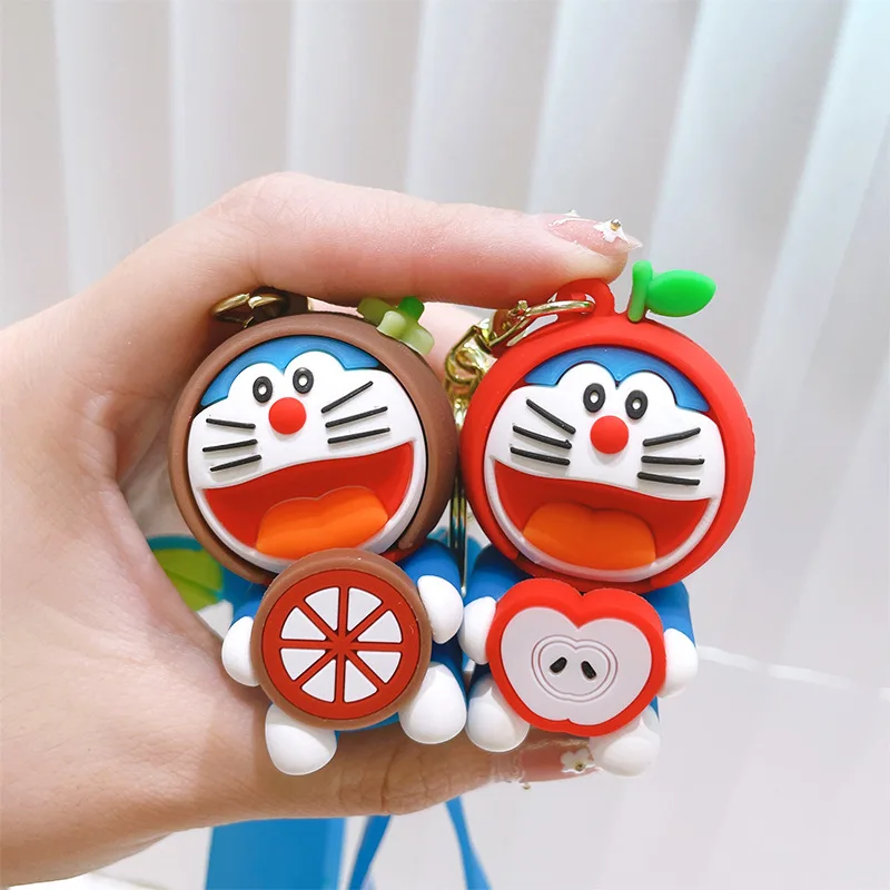 Брелок из ПВХ в виде мультяшных фруктов Doraemon, креативный милый брелок в виде кота с сумкой, подвесная машинка в виде кошки, детские подарки
Брелок из ПВХ в виде мультяшных фруктов Doraemon, креативный милый брелок в виде кота с сумкой, подвесная машинка в виде кошки, детские подарки