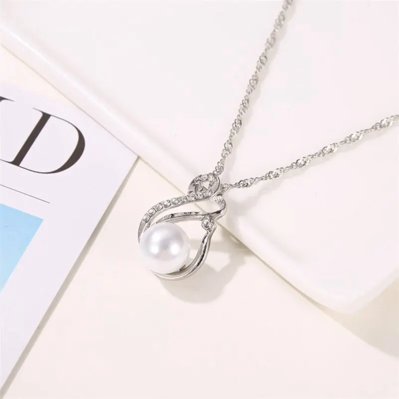 Elegant Wedding Jewelry Set For Bride Crystal Imitation Pearl Pendant Necklace Earrings Jewelry Sets
Elegant Wedding Jewelry Set For Bride Crystal Imitation Pearl Pendant Necklace Earrings Jewelry Sets