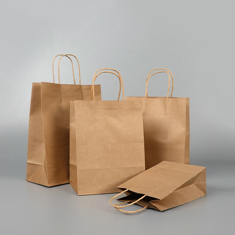 10pcs/lot Kraft Paper Bag with Handle Wedding Party Bag Fashionable Cloth Shoes Gift Paper Bags 3 Size Multifunction
10pcs/lot Kraft Paper Bag with Handle Wedding Party Bag Fashionable Cloth Shoes Gift Paper Bags 3 Size Multifunction