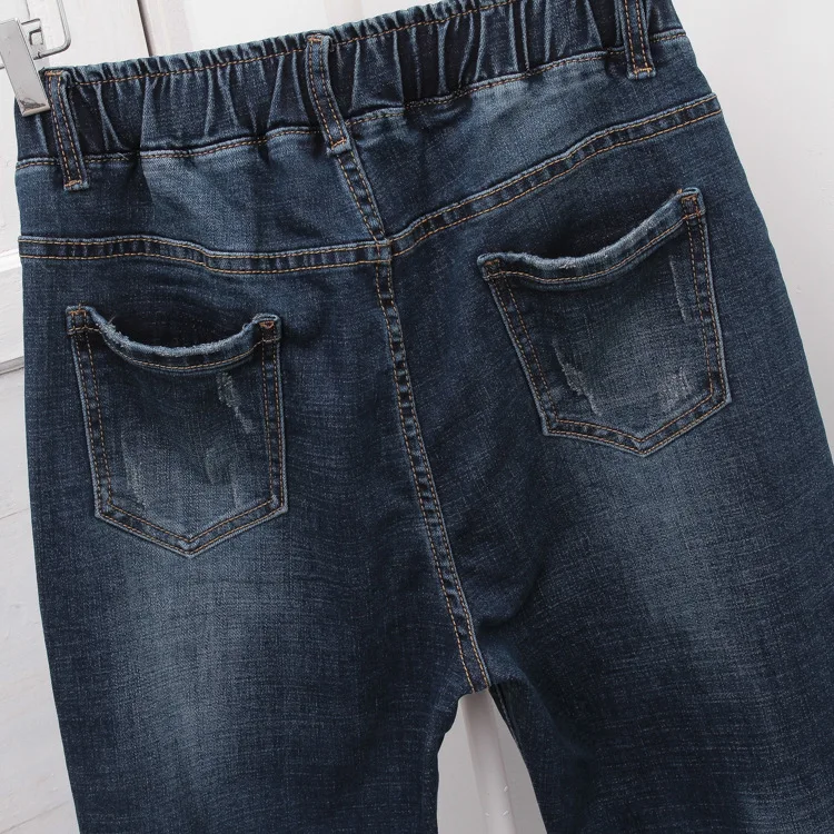 Women's Elastic Waist Stretch Mom Jeans Plus Size for Women Loose Oversize Harem Jeans Pants Button Jean Boyfriend Femme 4XL 5XL
Women's Elastic Waist Stretch Mom Jeans Plus Size for Women Loose Oversize Harem Jeans Pants Button Jean Boyfriend Femme 4XL 5XL