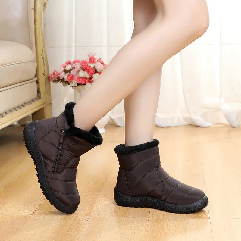 Winter Cotton Shoes Waterproof Short Tube Snow Boots Women's Soft Bottom Anti-Skid Plush Shoes
Winter Cotton Shoes Waterproof Short Tube Snow Boots Women's Soft Bottom Anti-Skid Plush Shoes