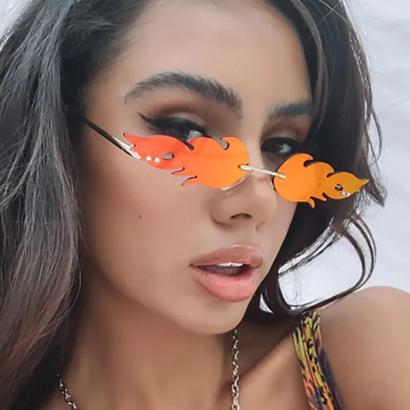 New 2020 Fashion Fire Flame Sunglasses Women Men Brand Design Rimless Wave Eyewear Luxury Trending Narrow Sun glasses Streetwear
New 2020 Fashion Fire Flame Sunglasses Women Men Brand Design Rimless Wave Eyewear Luxury Trending Narrow Sun glasses Streetwear