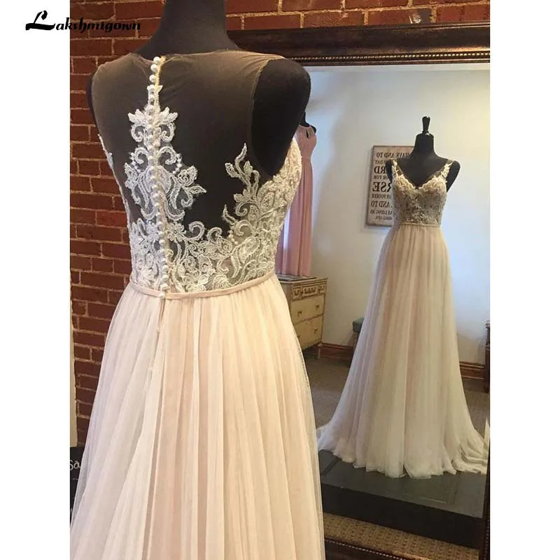 Vintage A Line Beach Boho Wedding Dress Sleeveless Lace Appliques Tulle V Neck Bridal Gown Robe De Mariee lakshmigown 2022
Vintage A Line Beach Boho Wedding Dress Sleeveless Lace Appliques Tulle V Neck Bridal Gown Robe De Mariee lakshmigown 2022