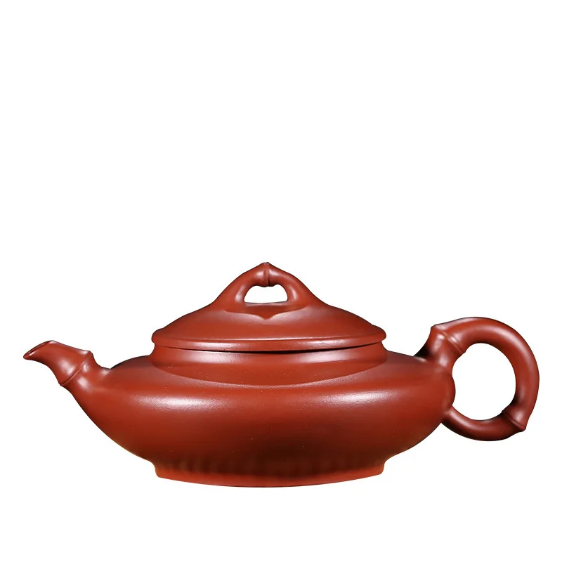Yixing Dark-red Enameled Pottery Teapot Famous Competitive Products Manual Raw Ore Bright Red Robe Bamboo Section Teapot Gift
Yixing Dark-red Enameled Pottery Teapot Famous Competitive Products Manual Raw Ore Bright Red Robe Bamboo Section Teapot Gift
