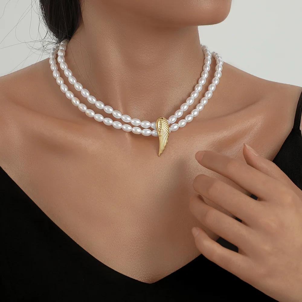 Retro Fashion Temperament Double-layer Pearl Necklace Wings Pendant beaded clavicle chain Chokers for Women Girls Gifts
Retro Fashion Temperament Double-layer Pearl Necklace Wings Pendant beaded clavicle chain Chokers for Women Girls Gifts