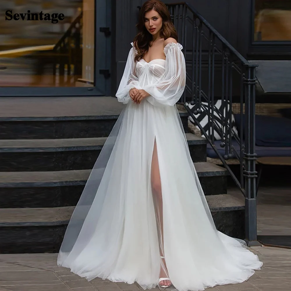 Sevintage High Side Split Wedding Dresses Sweetheart Full Sleeves Boho Bridal Gown Backless Puff Sleeves Tulle Wedding Gowns
Sevintage High Side Split Wedding Dresses Sweetheart Full Sleeves Boho Bridal Gown Backless Puff Sleeves Tulle Wedding Gowns