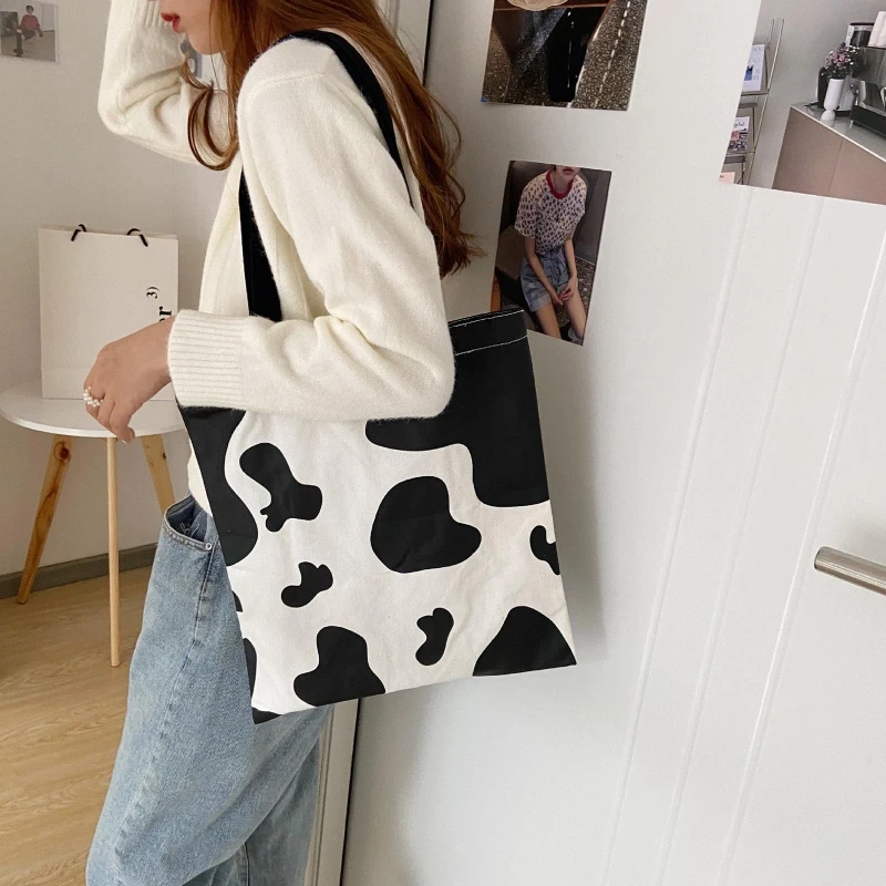 Cute Cartoon Cow Print Canvas Tote Women Handbag Lady Casual Large Capacity Shoulder Bag Female Travel Reusable Shopping Purse
Cute Cartoon Cow Print Canvas Tote Women Handbag Lady Casual Large Capacity Shoulder Bag Female Travel Reusable Shopping Purse