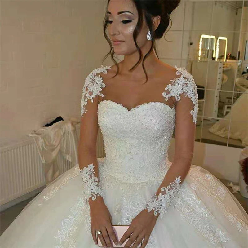 Luxury Wedding Dresses A-Line O-Neck Full Sleeves Tulle Floor-length Appliques Lace Up Illusion Bridal Gowns Vestido De Novia
Luxury Wedding Dresses A-Line O-Neck Full Sleeves Tulle Floor-length Appliques Lace Up Illusion Bridal Gowns Vestido De Novia