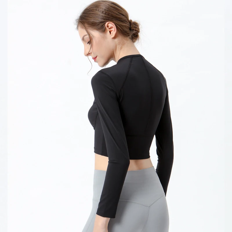 Long Sleeve Yoga Shirt Women Tight Slim Running Solid Color Fitness T-shirt Stretch Skin-Friendly Gym Top Sports Crop Top Female
Long Sleeve Yoga Shirt Women Tight Slim Running Solid Color Fitness T-shirt Stretch Skin-Friendly Gym Top Sports Crop Top Female