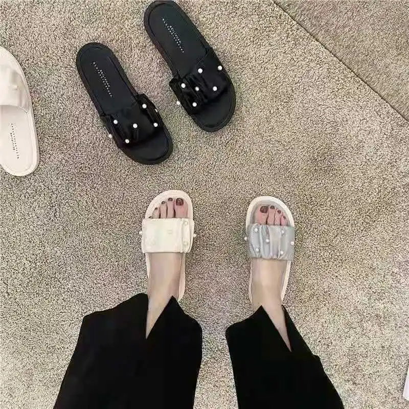 2021 summer new style net celebrity explosion pearl slippers female outer wear fashion super fire wild sandals ins trend
2021 summer new style net celebrity explosion pearl slippers female outer wear fashion super fire wild sandals ins trend