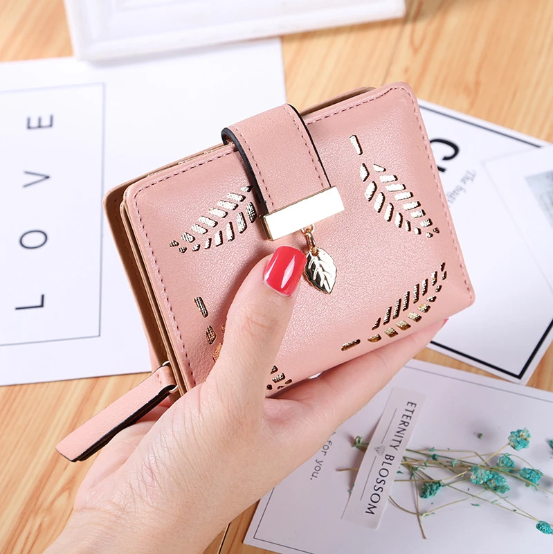 New Korean Short Wallet Ladies Zipper Buckle Hollow Leaves Small Wallet Card Package
New Korean Short Wallet Ladies Zipper Buckle Hollow Leaves Small Wallet Card Package