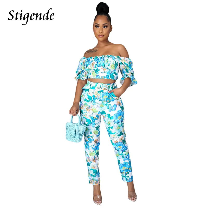 Stigende Bohemian Floral Print Two Piece Pants Set Women Sexy Summer Bodycon Outfits Off Shoulder Crop Top and Pocket Trousers
Stigende Bohemian Floral Print Two Piece Pants Set Women Sexy Summer Bodycon Outfits Off Shoulder Crop Top and Pocket Trousers