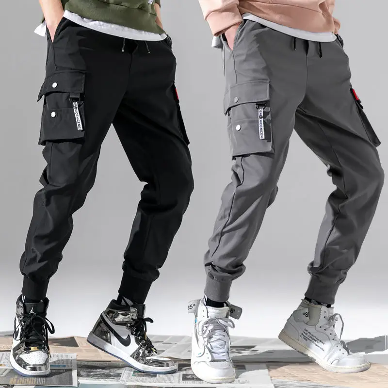 2021 Ribbons Harem Joggers Men Cargo Pants Streetwear Hip Hop Casual Pockets Track Pants Male Harajuku Fashion Trousers S-4XL
2021 Ribbons Harem Joggers Men Cargo Pants Streetwear Hip Hop Casual Pockets Track Pants Male Harajuku Fashion Trousers S-4XL