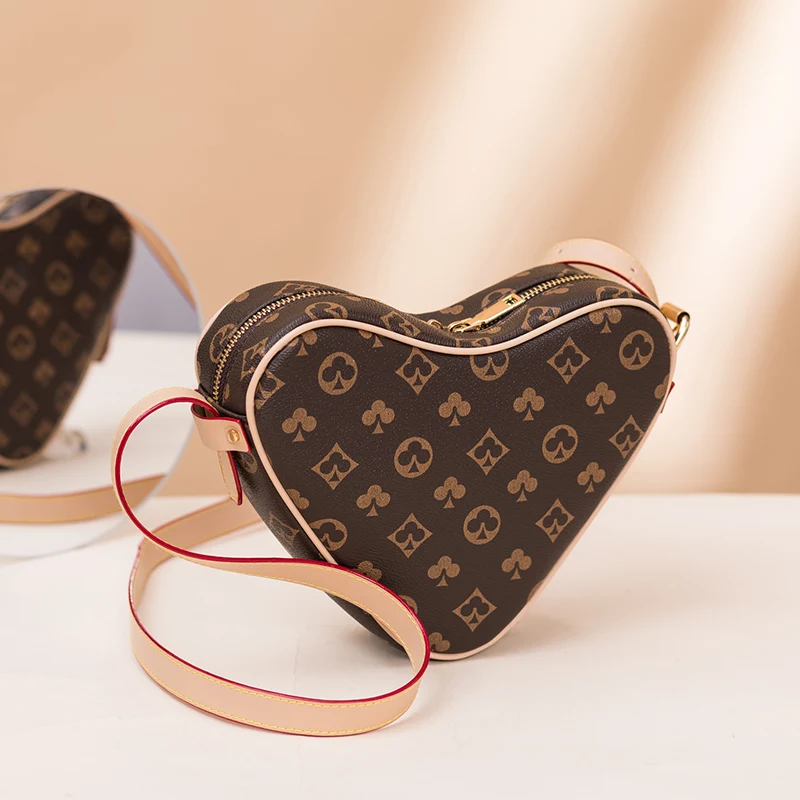 New Fashion Elegant Retro Printing Leather Heart-Shaped Bag Love Bag Ladies One-Shoulder Diagonal Bag Women's Bag
New Fashion Elegant Retro Printing Leather Heart-Shaped Bag Love Bag Ladies One-Shoulder Diagonal Bag Women's Bag
