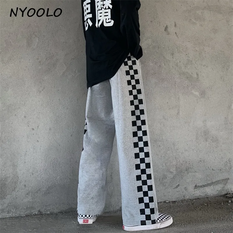 NYOOLO Vintage streetwear plaid print Straight pants women Harajuku elastic waist hip hop skateboard ankle length jogger pants
NYOOLO Vintage streetwear plaid print Straight pants women Harajuku elastic waist hip hop skateboard ankle length jogger pants