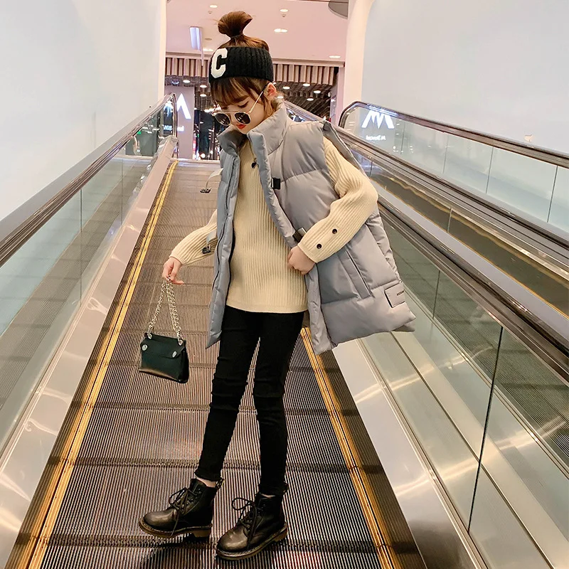 Детский осенне-зимний плотный теплый жилет, однотонное пальто без рукавов для подростков, Детская Хлопковая водолазка средней длины для девочек, верхняя одежда
Детский осенне-зимний плотный теплый жилет, однотонное пальто без рукавов для подростков, Детская Хлопковая водолазка средней длины для девочек, верхняя одежда