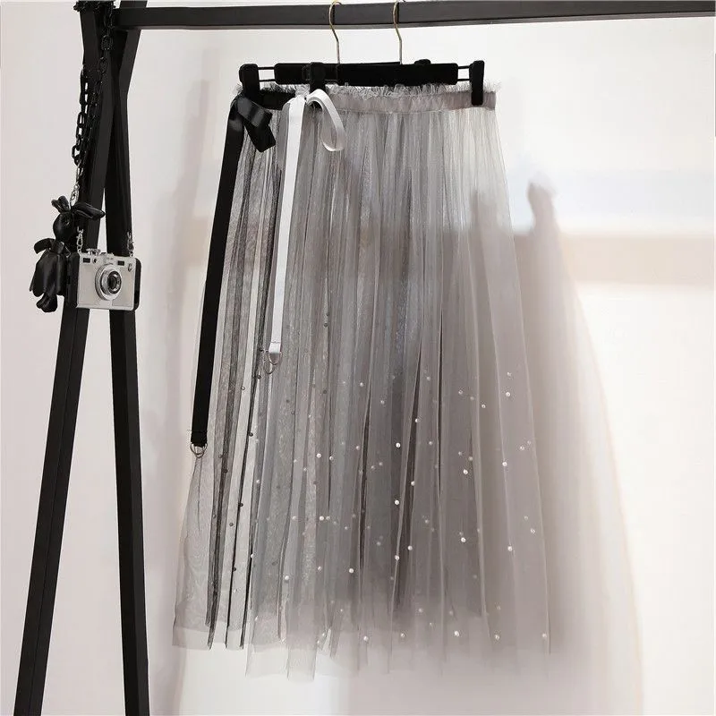 Летние модные юбки, женские пикантные длинные юбки с бисером, элегантные прозрачные кружевные плиссированные юбки с высокой талией
Летние модные юбки, женские пикантные длинные юбки с бисером, элегантные прозрачные кружевные плиссированные юбки с высокой талией