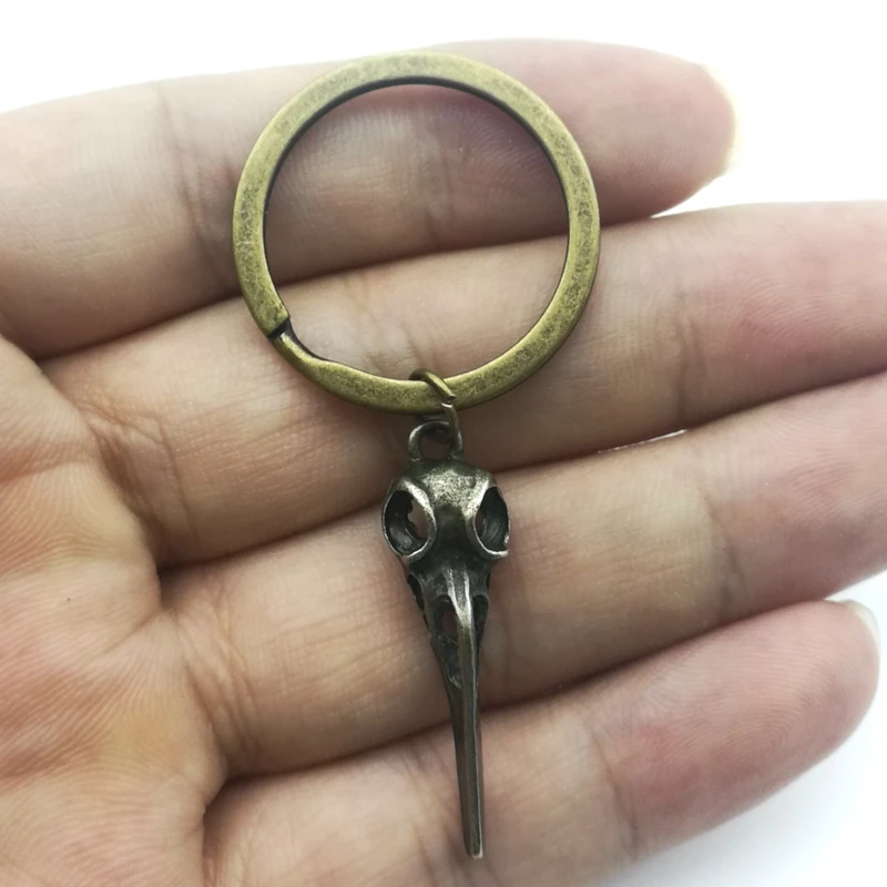 2020 New Bird Skull Keychain Gothic Dangle Long Keychain Steampunk Pentagram Raven Skull Key Ringhalloween Gift
2020 New Bird Skull Keychain Gothic Dangle Long Keychain Steampunk Pentagram Raven Skull Key Ringhalloween Gift
