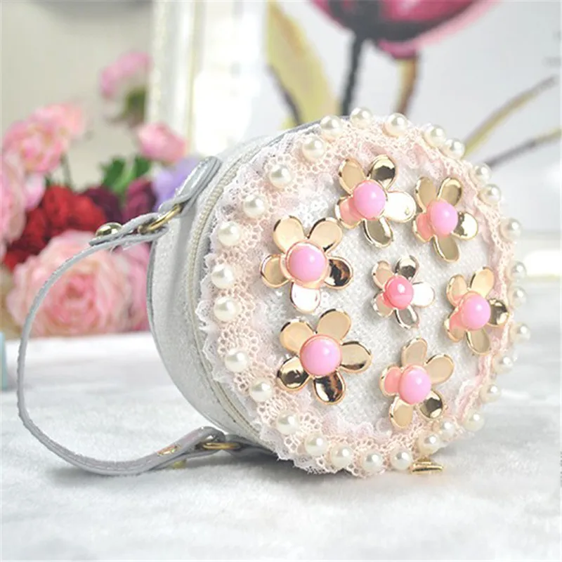 Kids Pearl Round Totes Luxury Sequins Child Shoulder Messenger Bags Baby Girl Mini Handbag Gifts Leather Princess Flowers Bags
Kids Pearl Round Totes Luxury Sequins Child Shoulder Messenger Bags Baby Girl Mini Handbag Gifts Leather Princess Flowers Bags