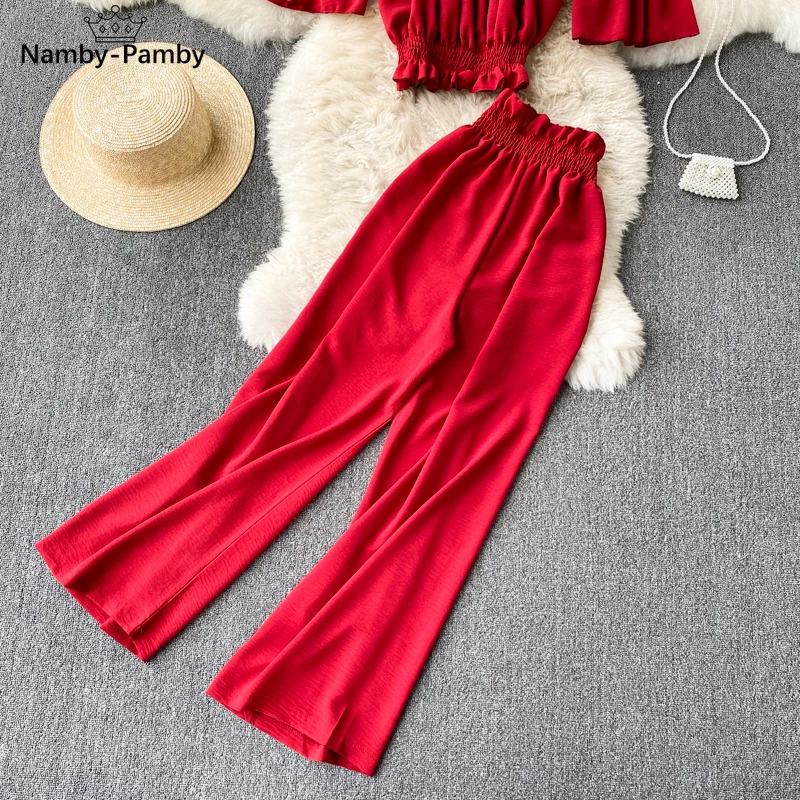 2021 Women's Spring Fashion New Korean Style Ear Edge Shoulder Short Shirt + High Waist Slim Wide Leg Pants Tops D0143
2021 Women's Spring Fashion New Korean Style Ear Edge Shoulder Short Shirt + High Waist Slim Wide Leg Pants Tops D0143