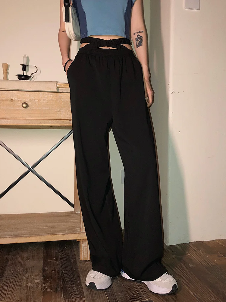 Брюки женские повседневные с завышенной талией, свободные дизайнерские тонкие широкие штаны с бретельками, черные, на лето
Брюки женские повседневные с завышенной талией, свободные дизайнерские тонкие широкие штаны с бретельками, черные, на лето