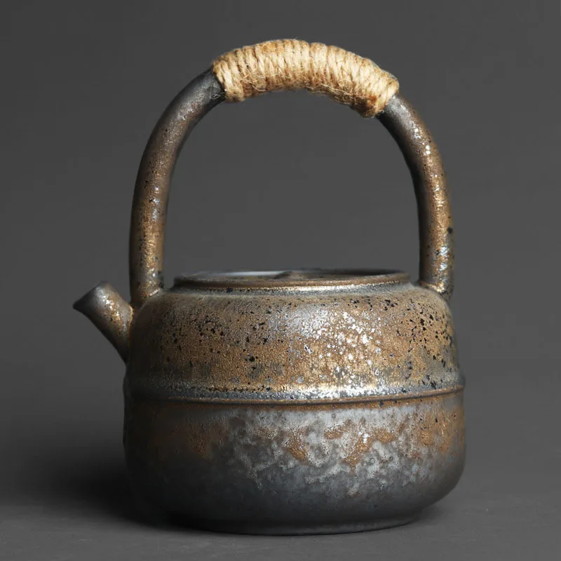 460ml Japanese-style kiln changed retro stoneware large-sized handle teapot handmade pottery kung fu wide-mouth warm tea kettle
460ml Japanese-style kiln changed retro stoneware large-sized handle teapot handmade pottery kung fu wide-mouth warm tea kettle