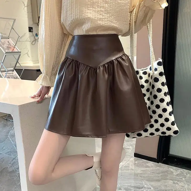 PU Short Pleated Skirt Autumn Women Solid Color Leather Winter Skirts Womens Slim High Waist Chic Zipper Mini Skirt
PU Short Pleated Skirt Autumn Women Solid Color Leather Winter Skirts Womens Slim High Waist Chic Zipper Mini Skirt