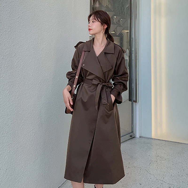 ZCWXM Autumn Women Long Trench Coat with Belt High Street Solid Color Turndown Collar Slim Fashion Outwear Ladies Windbreaker
ZCWXM Autumn Women Long Trench Coat with Belt High Street Solid Color Turndown Collar Slim Fashion Outwear Ladies Windbreaker