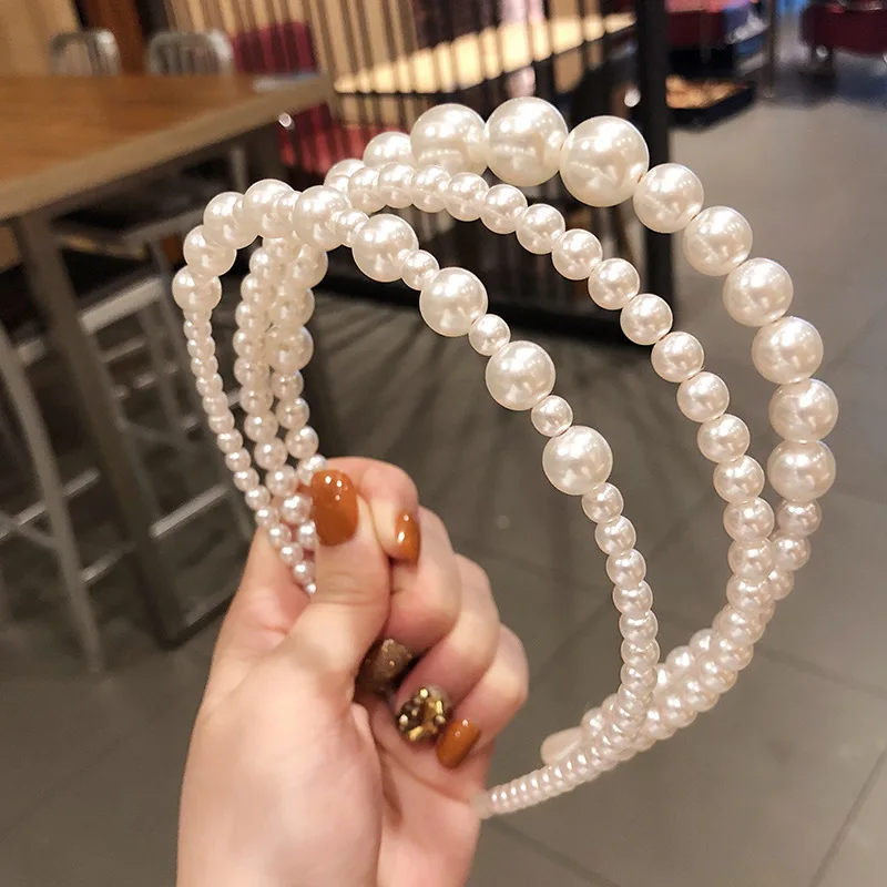 Pearl headband celebrity super fairy temperament sweet simple and versatile wash your face and go out to press hair headdress
Pearl headband celebrity super fairy temperament sweet simple and versatile wash your face and go out to press hair headdress