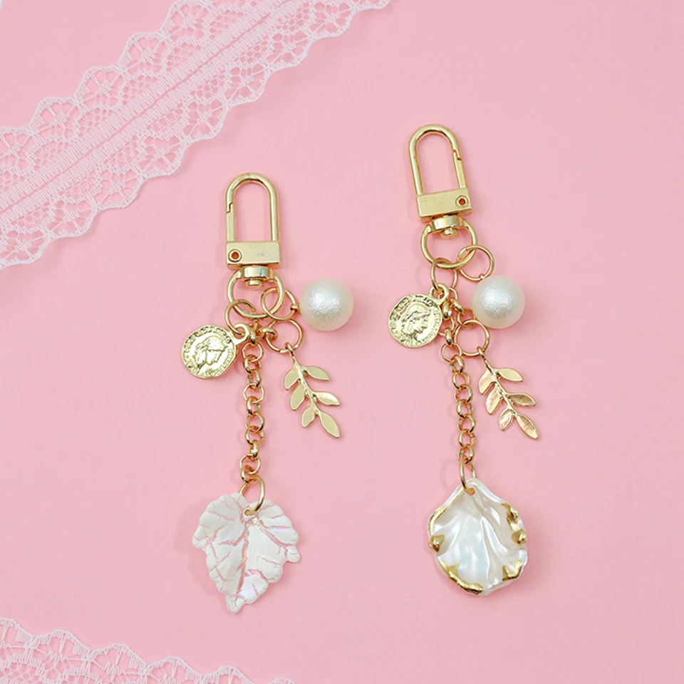 Delicate Baroque vintage pearl chain Shell Maple Leaf Keychain Womens Keyring Bag Backpack Pendant Keyfob Car keys Holder Gifts
Delicate Baroque vintage pearl chain Shell Maple Leaf Keychain Womens Keyring Bag Backpack Pendant Keyfob Car keys Holder Gifts