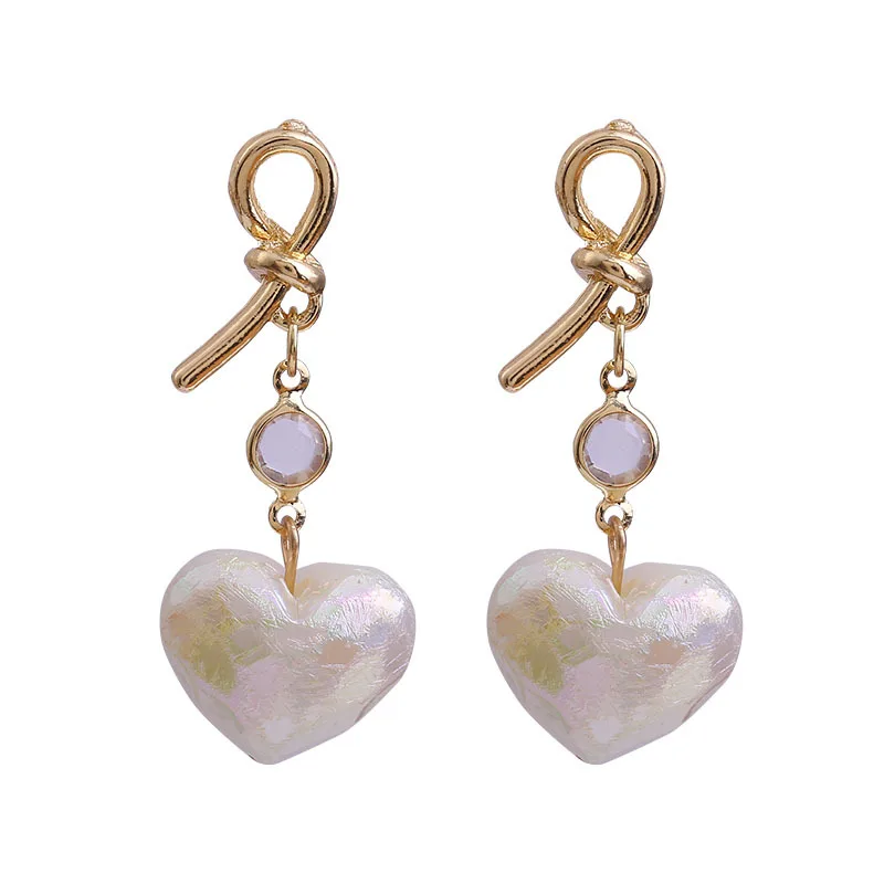 2020 New Fashion Polarized Love Heart Pearl Dangle Earrings Sweet Elegant Temperament Knot Earring Women Wedding Bridal Jewelry
2020 New Fashion Polarized Love Heart Pearl Dangle Earrings Sweet Elegant Temperament Knot Earring Women Wedding Bridal Jewelry