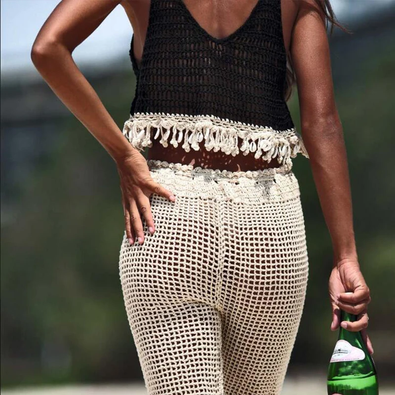 Mossha Fishnet bikini 2020 Long beach pants Hollow out swimsuit female cover-ups Deep v-neck crop top beach wear Tassel kimono 
Mossha Fishnet bikini 2020 Long beach pants Hollow out swimsuit female cover-ups Deep v-neck crop top beach wear Tassel kimono