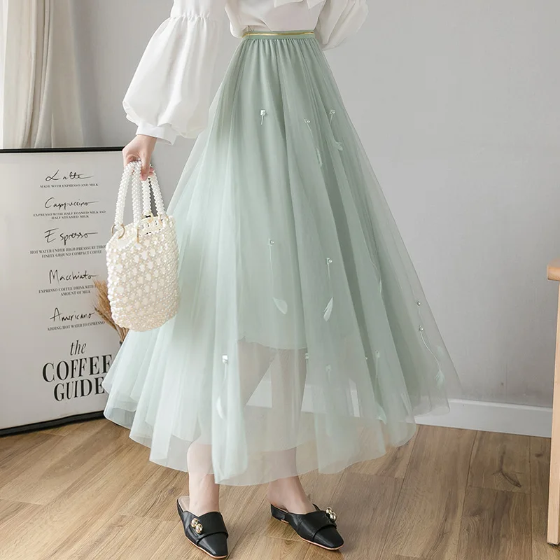 Женская длинная фатиновая юбка Симпатичные, с перьями, сетчатая юбка с высокой талией, Женская однотонная Зимняя юбка с эластичной талией 
Женская длинная фатиновая юбка Симпатичные, с перьями, сетчатая юбка с высокой талией, Женская однотонная Зимняя юбка с эластичной талией