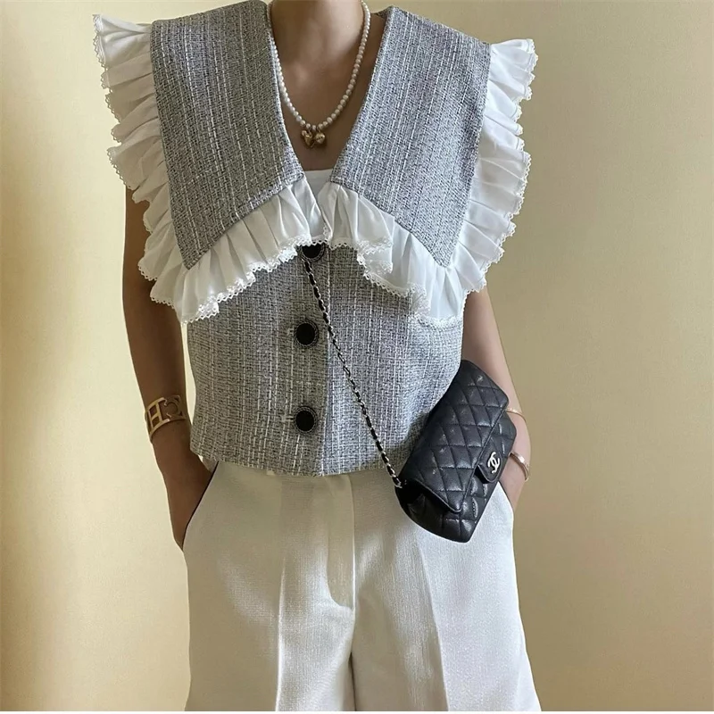 Korean Small Fragrance Style Age-reducing Doll Collar Sweet Wind Loose and Thin Short Coat
Korean Small Fragrance Style Age-reducing Doll Collar Sweet Wind Loose and Thin Short Coat