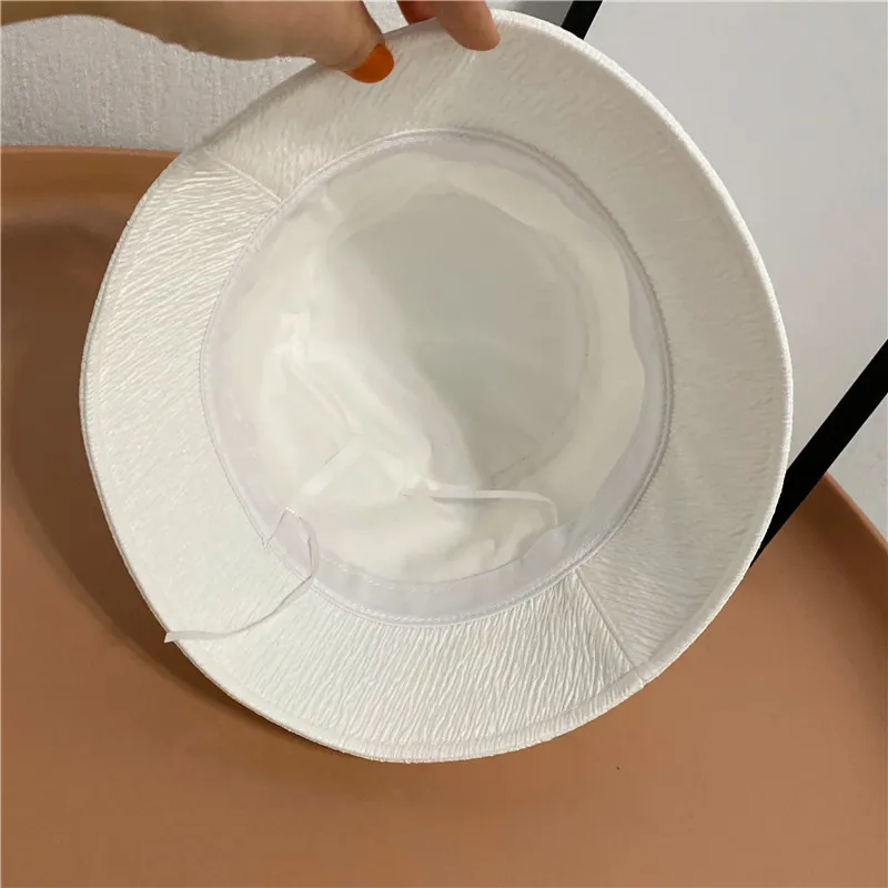 202103-2508302 new spring fold gloss Fabric letter sun bucket cap women leisure hat
202103-2508302 new spring fold gloss Fabric letter sun bucket cap women leisure hat