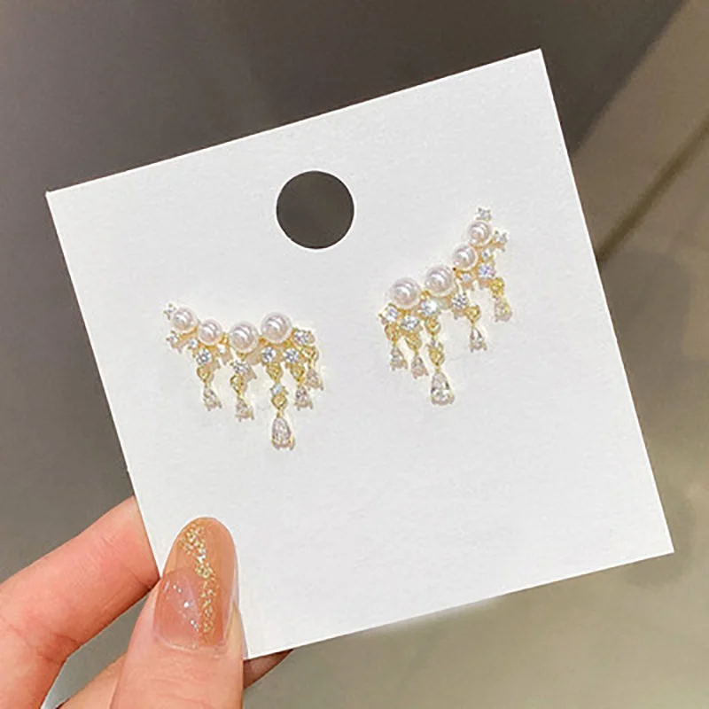 Pearl Earrings 925 Silver Needle Water Drop Tassel Temperament Korean Fashion Personality Net Red Earrings Female
Pearl Earrings 925 Silver Needle Water Drop Tassel Temperament Korean Fashion Personality Net Red Earrings Female