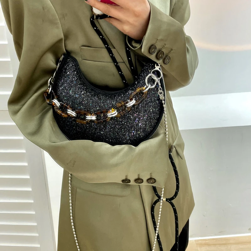 2021 Spring New Korean Female Bag Solid Color Saddle Bag Sequins Wild Crescent Handbag Crescent Shaped Underarm Bag Shoulder Bag
2021 Spring New Korean Female Bag Solid Color Saddle Bag Sequins Wild Crescent Handbag Crescent Shaped Underarm Bag Shoulder Bag