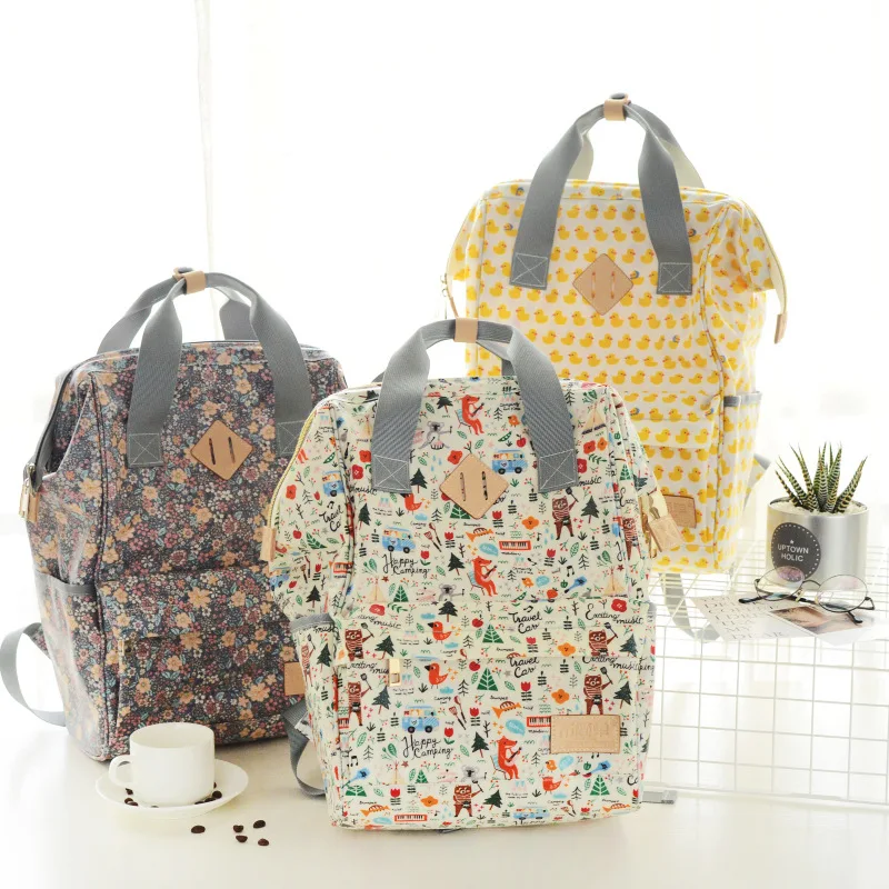 Floral Printed Cartoon Maternity Bag Fashion Multifunction Waterproof Large Capacity Diaper Backpack For Travel Baby Bag For Mom
Floral Printed Cartoon Maternity Bag Fashion Multifunction Waterproof Large Capacity Diaper Backpack For Travel Baby Bag For Mom