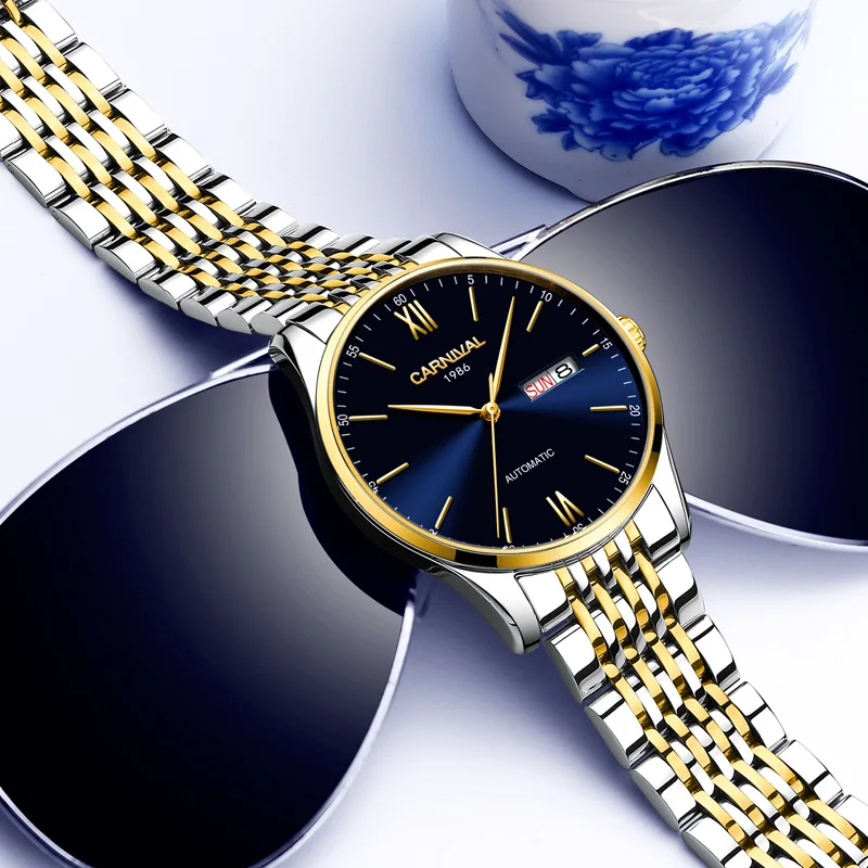 CARNIVAL 2021 New SEIKO Movement Automatic Watch Men Double Calendar Sapphire Mechanical Watches Waterproof Gold Watches for Men 
CARNIVAL 2021 New SEIKO Movement Automatic Watch Men Double Calendar Sapphire Mechanical Watches Waterproof Gold Watches for Men