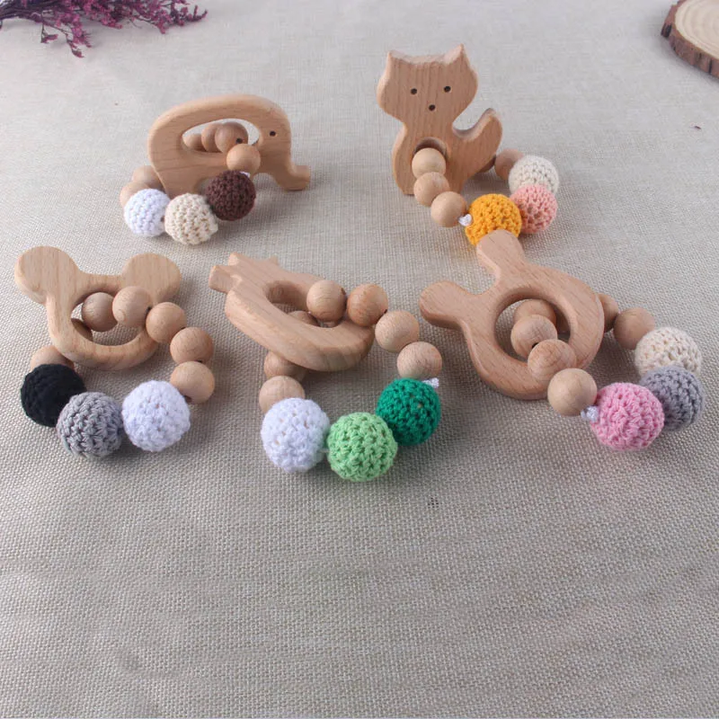 New 1PC Wooden Teether Rabbit Elephant Crochet Beads Wood Crafts Ring Engraved Bead Baby Teether Wooden Toys For Baby Rattle
New 1PC Wooden Teether Rabbit Elephant Crochet Beads Wood Crafts Ring Engraved Bead Baby Teether Wooden Toys For Baby Rattle